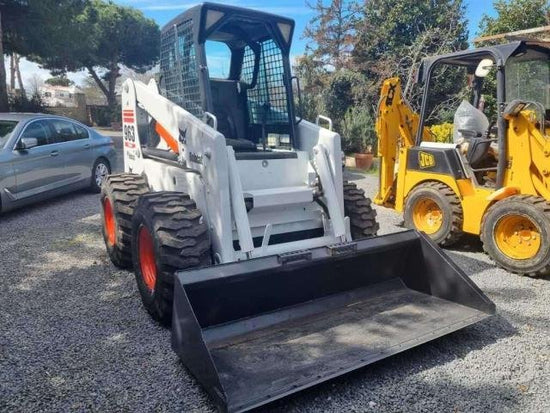 Minicarregadeira Bobcat 963